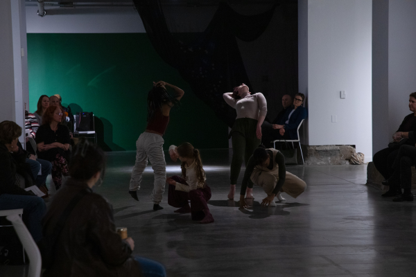A photo taken of the four dancers during the Grieving Landscapes performance.